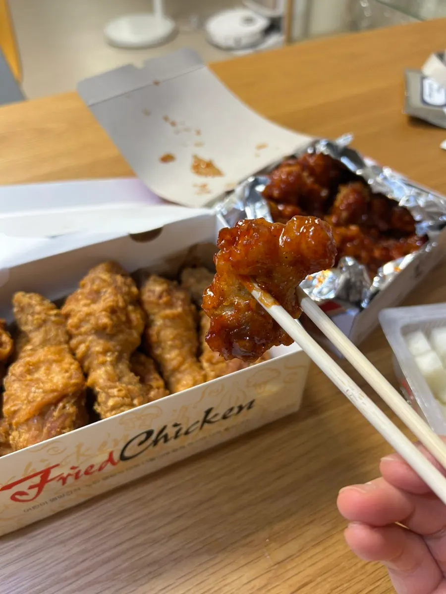 Close-up of dakgangjeong evenly coated in sauce