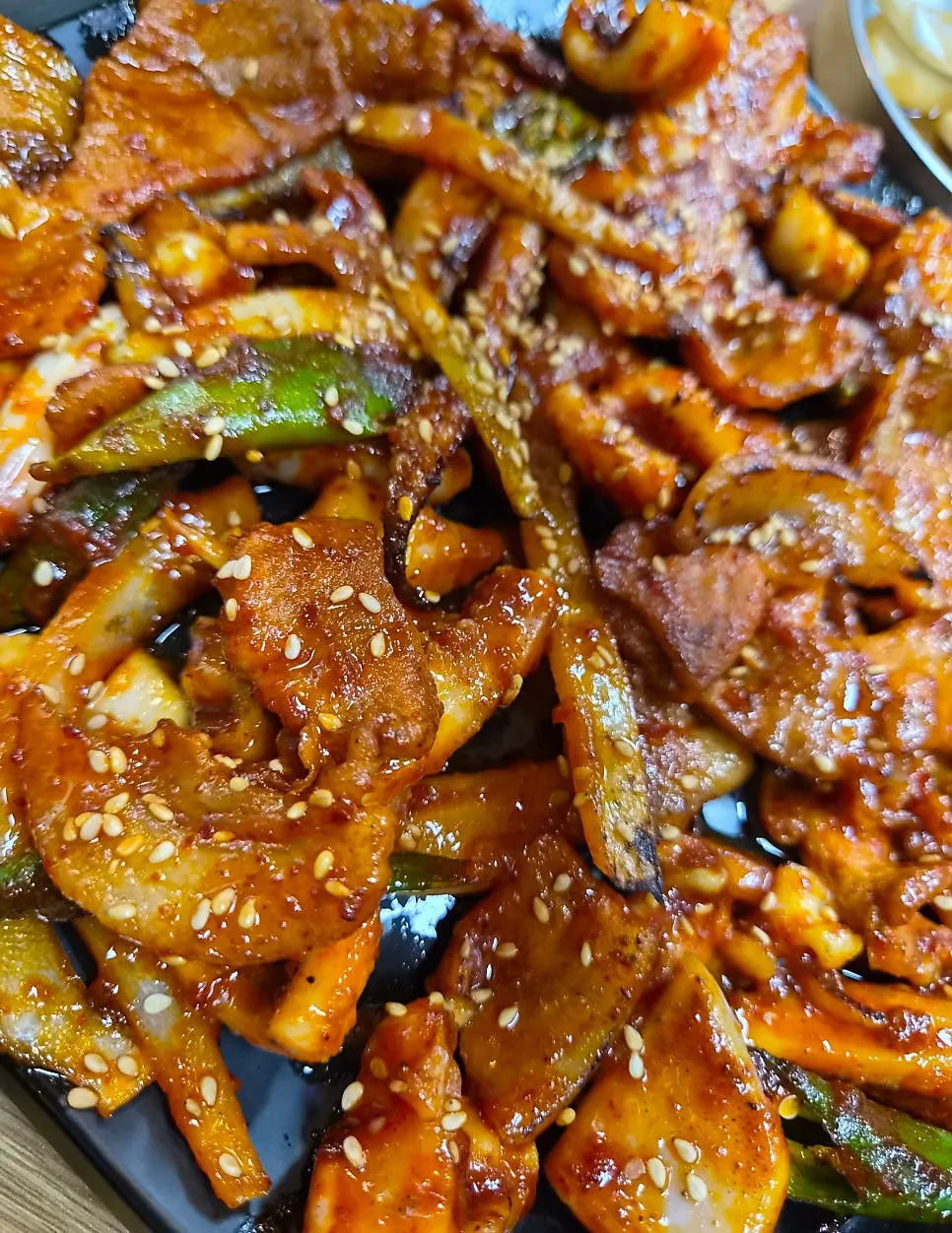 Close-up of ojam bulgogi grilled directly over charcoal