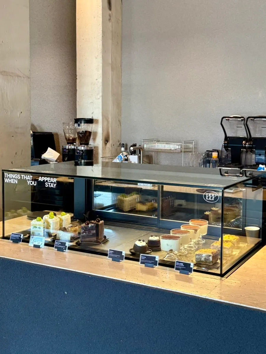 Cakes displayed in the showcase at Peer a Peer
