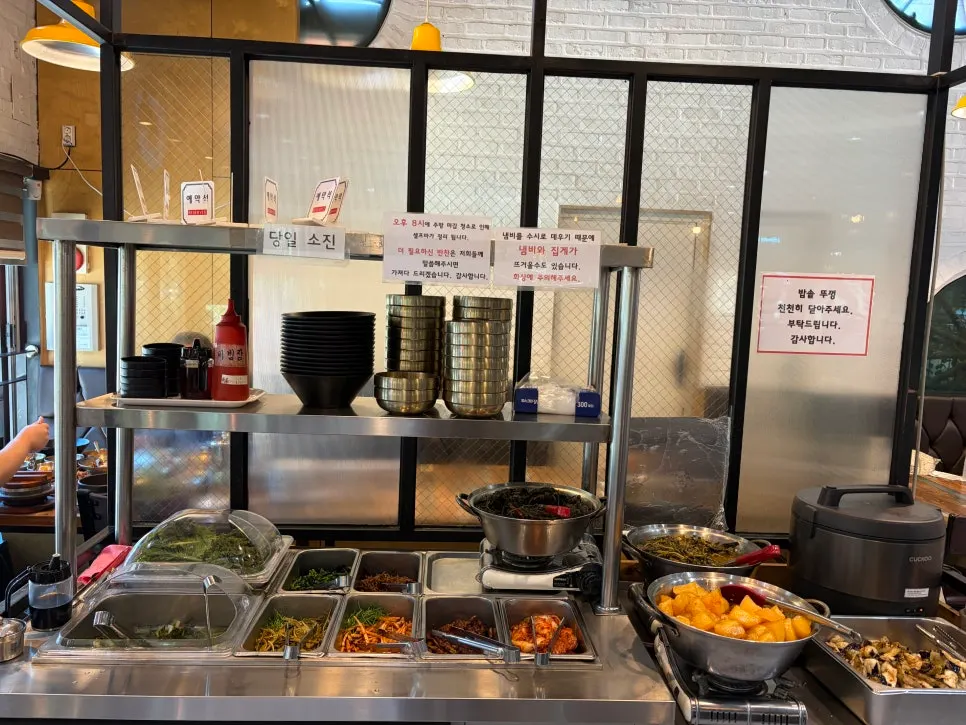 Self-serve side dish bar set up on one side of the restaurant