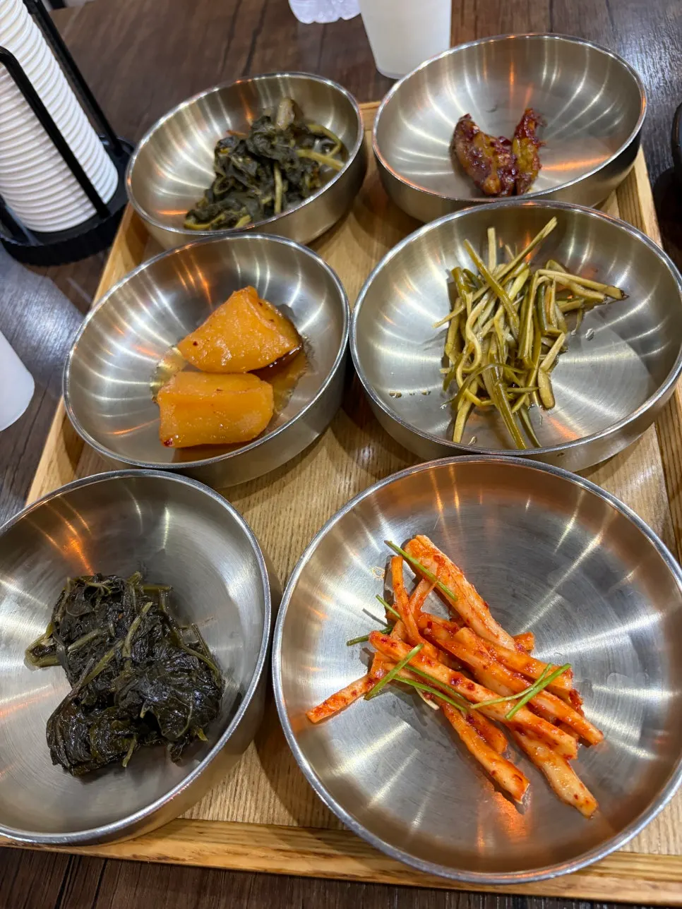 Plates of mildly seasoned basic side dishes
