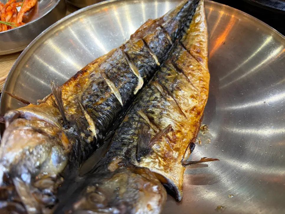 Mackerel flesh picked apart and ready to eat