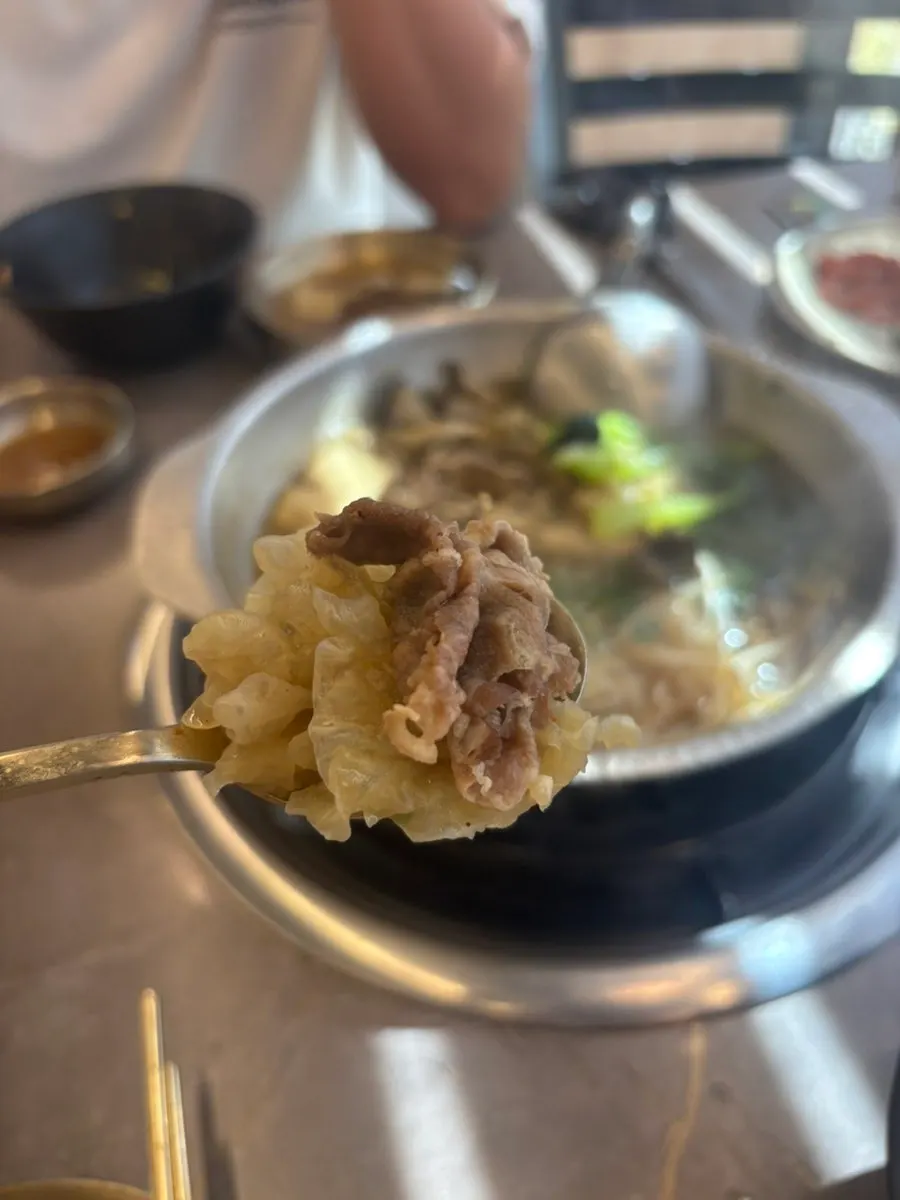 Shabu meat and mushrooms cooked in the broth