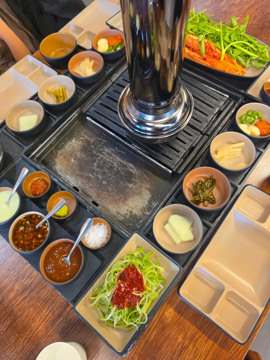 Self-serve bar with leafy wraps at Donpu The Grill
