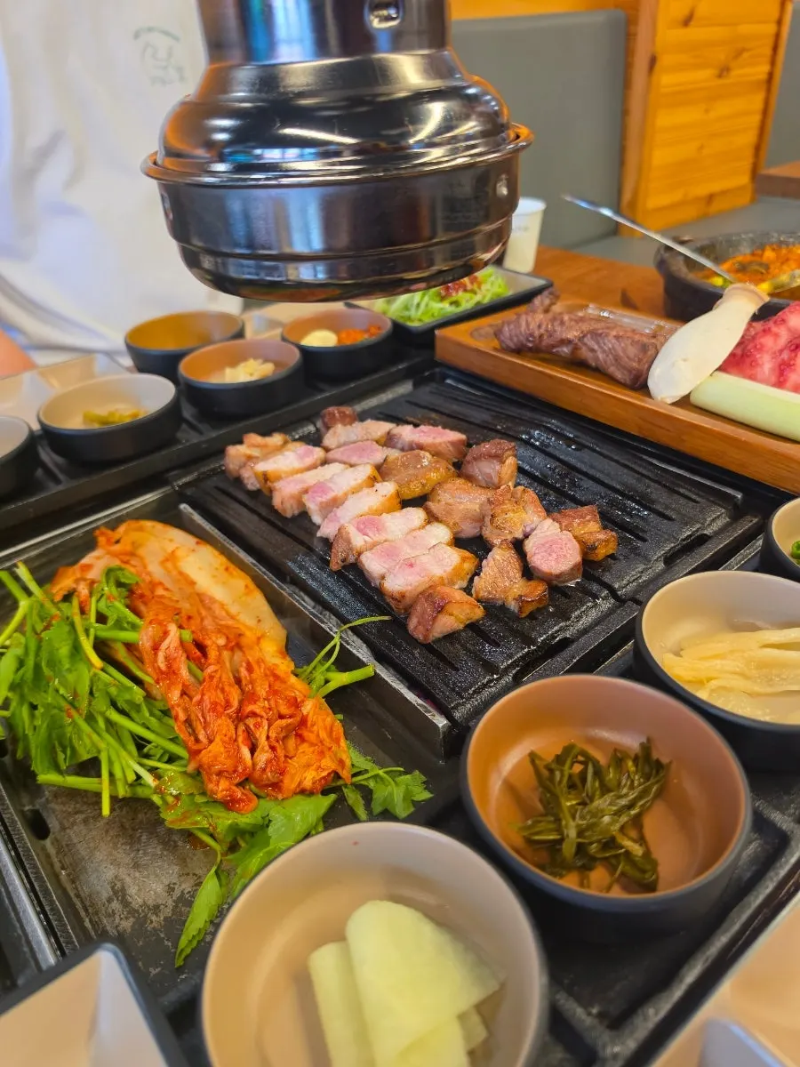 Kimchi and minari on the specially made grill plate