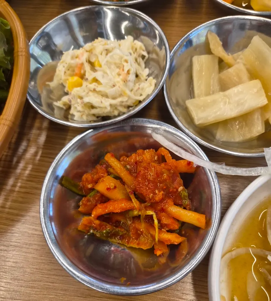 Frying kimchi pancake at the self-bar