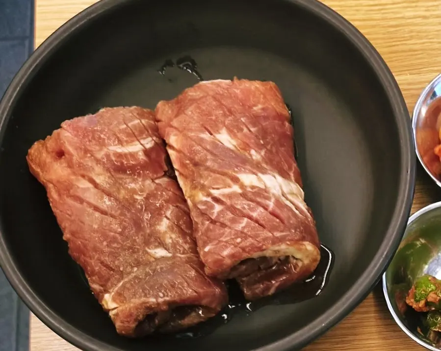 Two large servings of handmade domestic king pork ribs