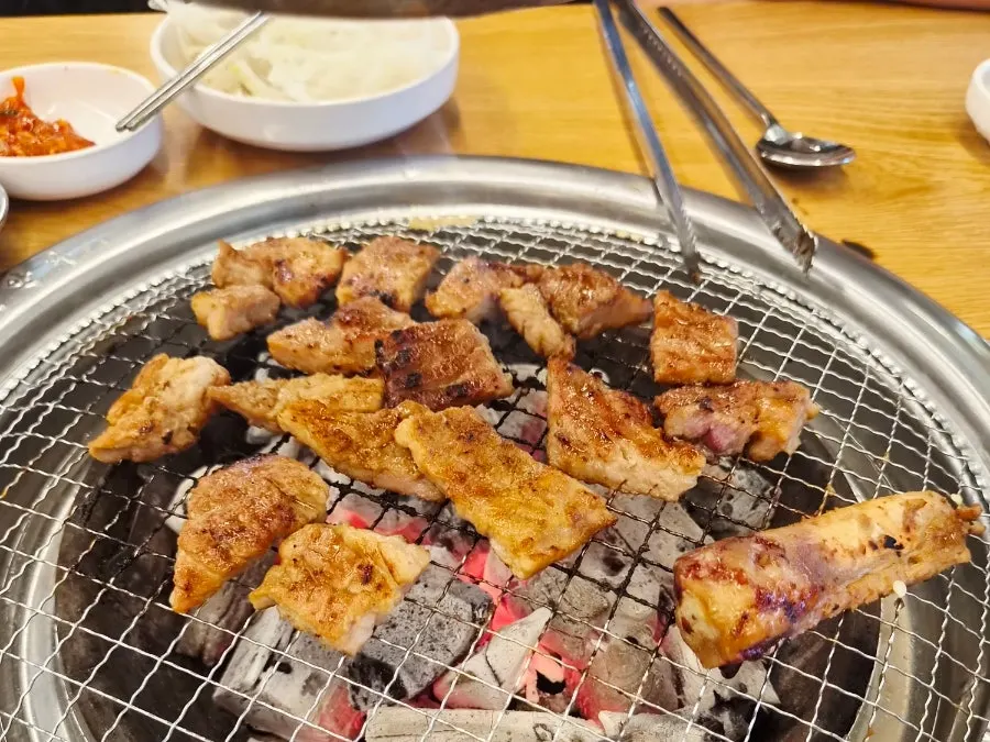 Golden brown handmade pork ribs with side dishes
