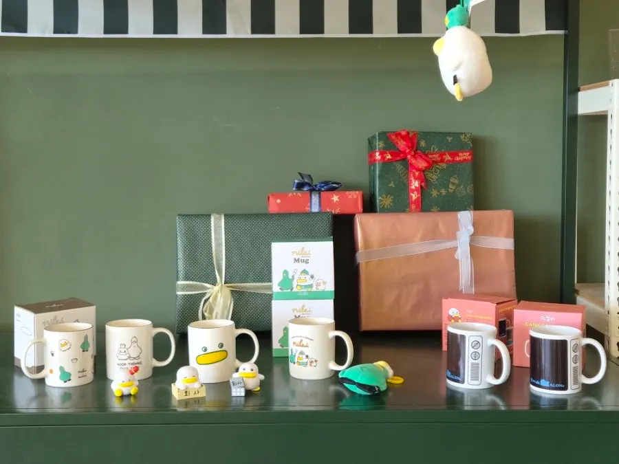 Corner selling goods featuring The Nillai's character