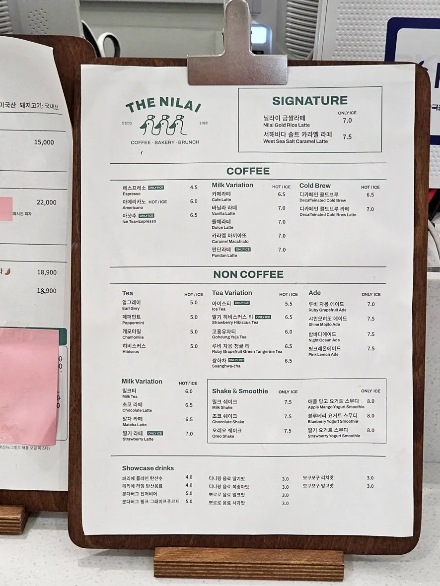 Menu board listing risotto and pasta