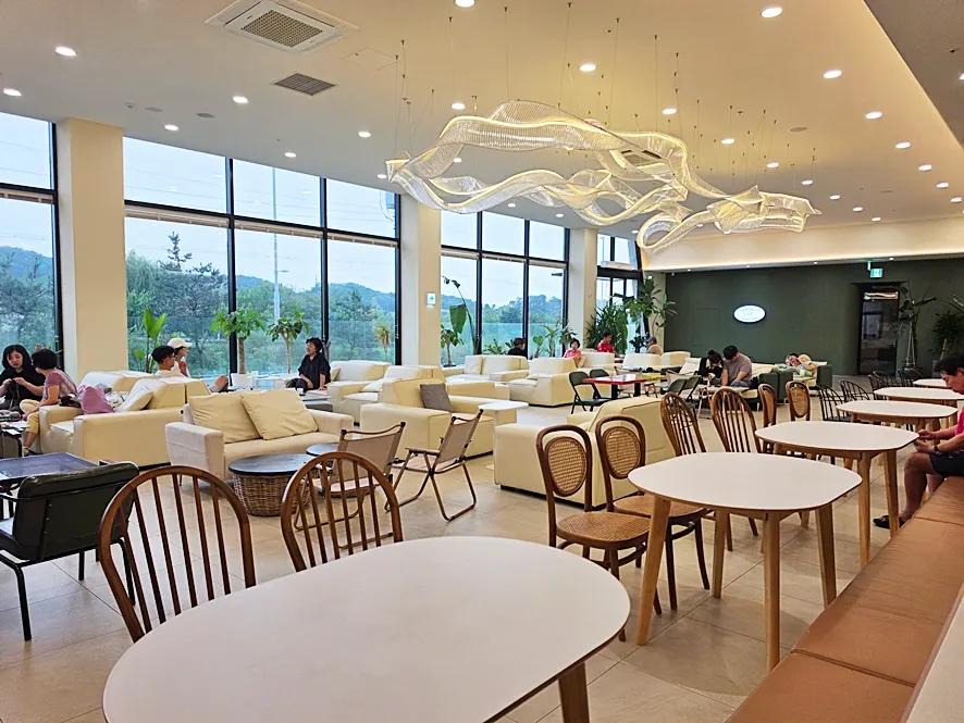 Café view combining the indoor garden and water feature