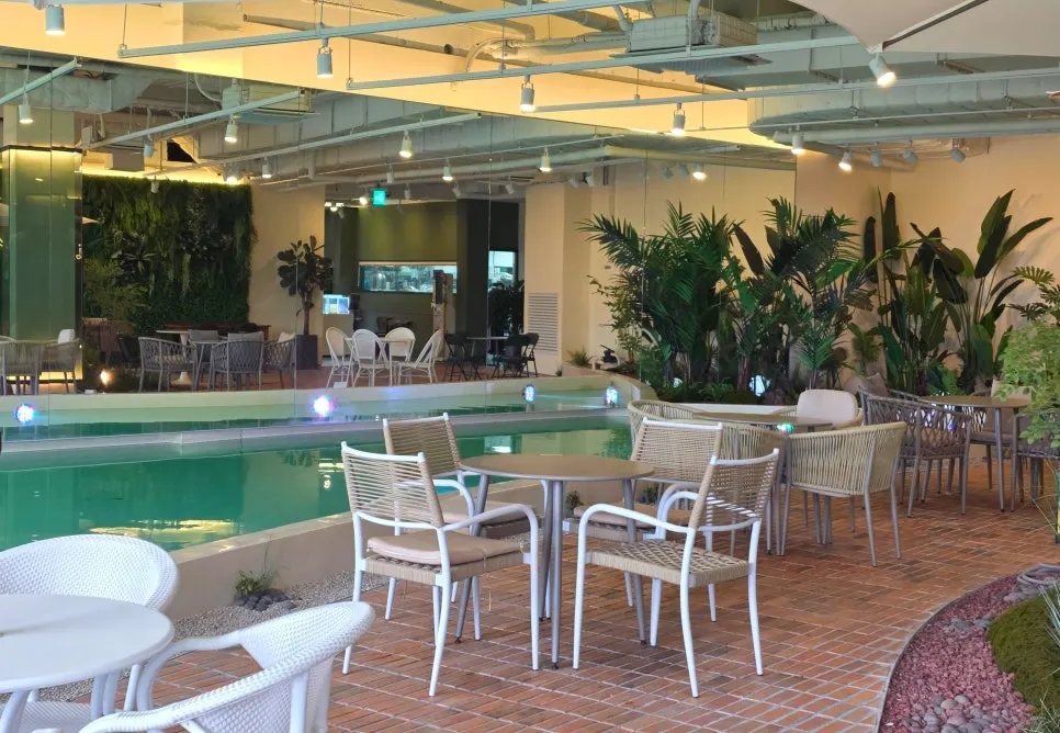 Interior of The Nillai with generously spaced tables
