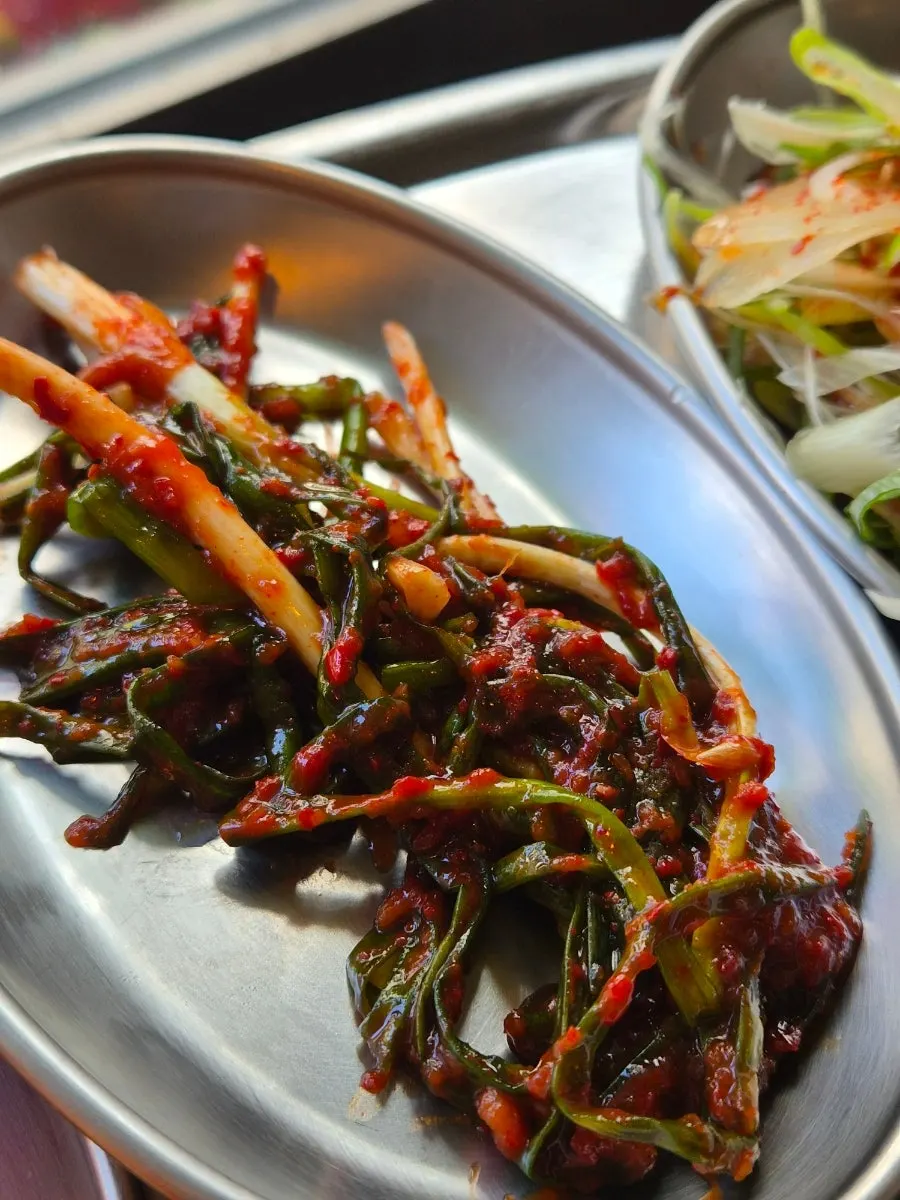 Plate of aged Korean pork with bright red marbling