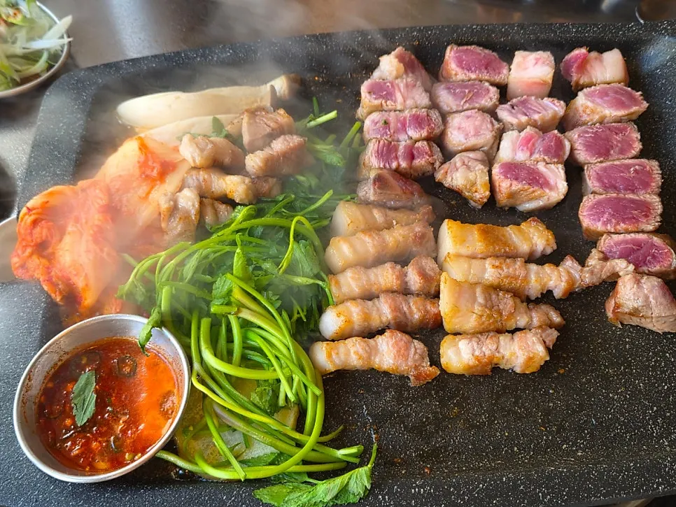 Basic banchan of domestic aged kimchi and minari