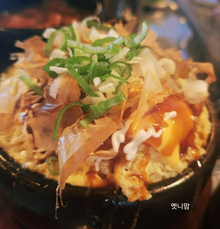 Bomb cheese steamed egg topped with bonito flakes