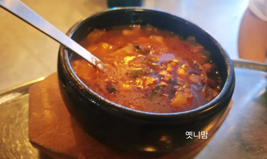 Complimentary kimchi jjigae
