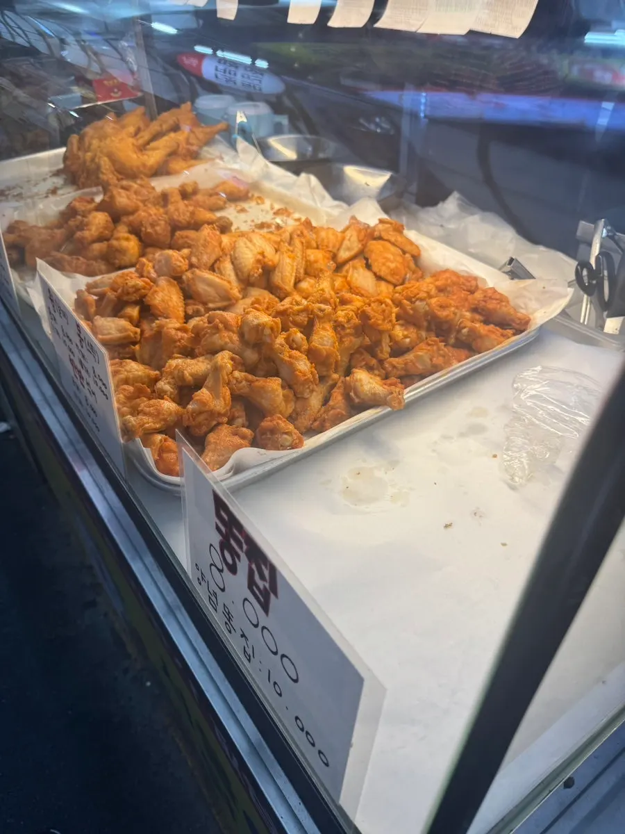 Display case with freshly fried chicken