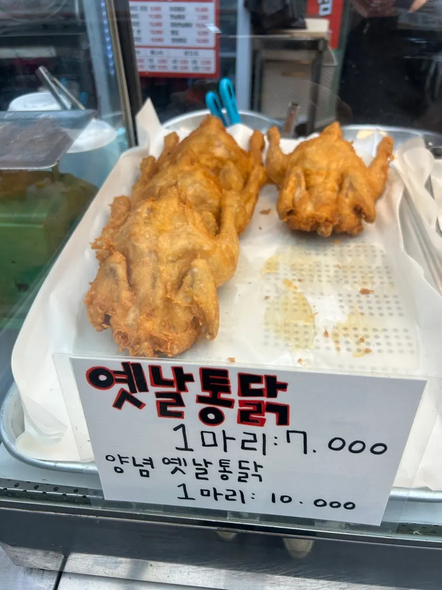 윙과 봉 단품 가격이 적힌 안내