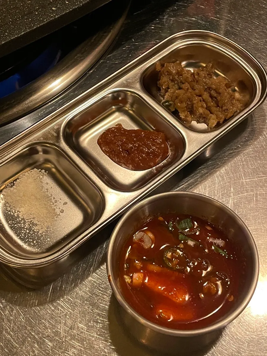 Menu page listing side dishes at Gim Sukseong Seongnae Branch