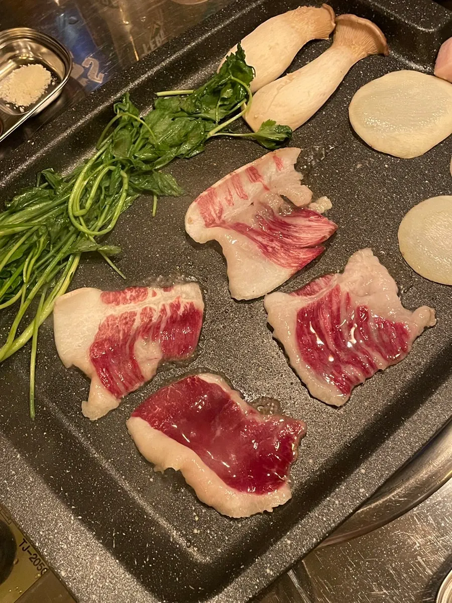Plate of minari to grill alongside the chadol