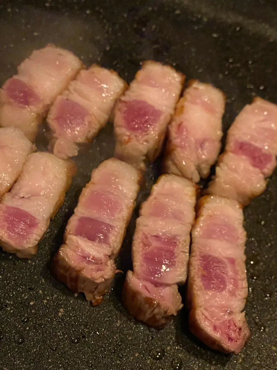 Raw thick-cut aged pork belly