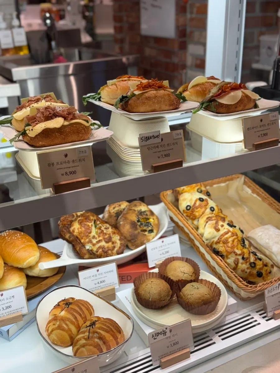 Close-up view of the bread display at Boulangerie Tan KINTEX