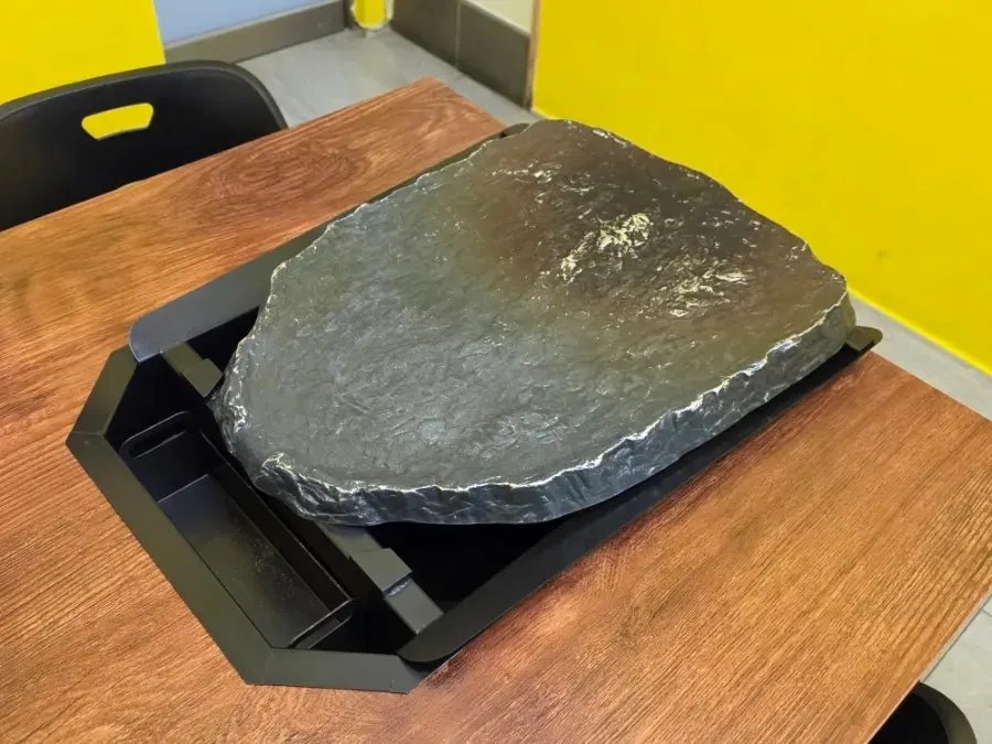 Large cast-iron grill pan set on the table