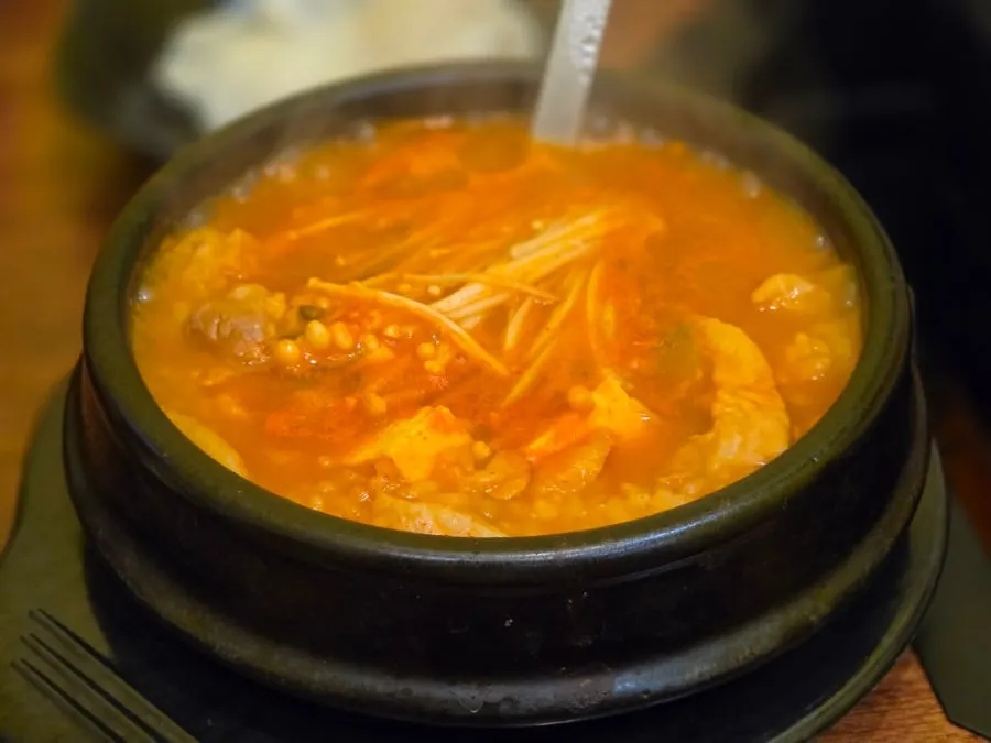 Doenjang sulbap boiling in an earthenware pot