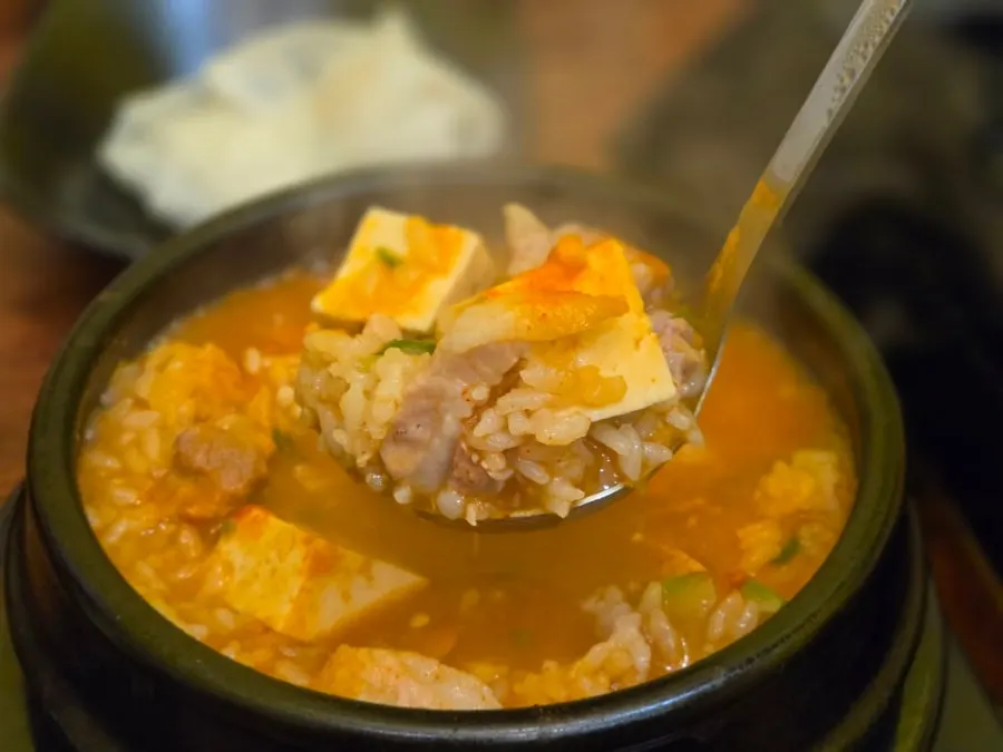 Inside of the doenjang sulbap with tofu and enoki mushrooms