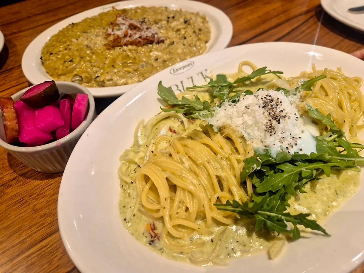 Abalone cream risotto topped with abalone