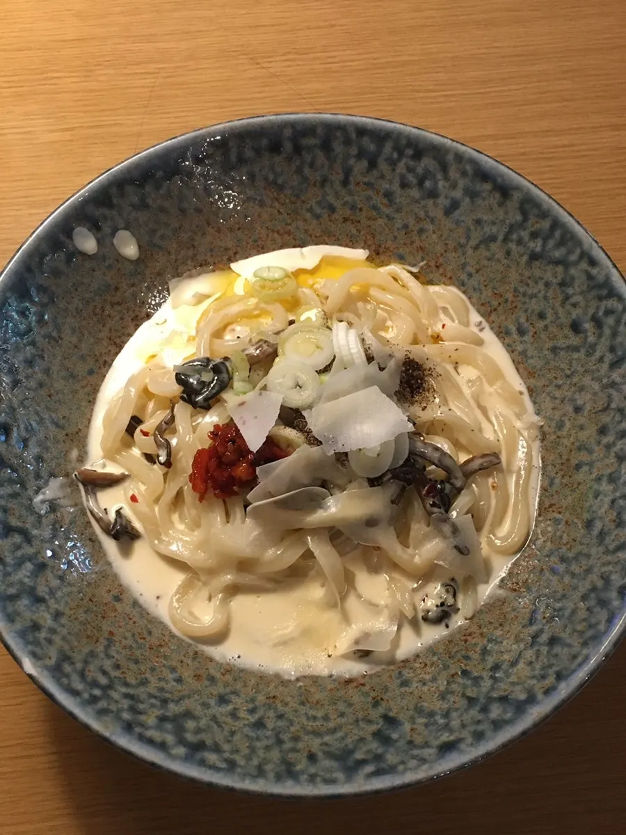 A bowl of rich perilla cream udon