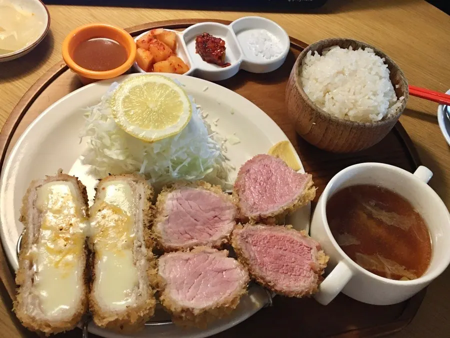 Table setting of hire+cheese katsu and rosukatsu just served