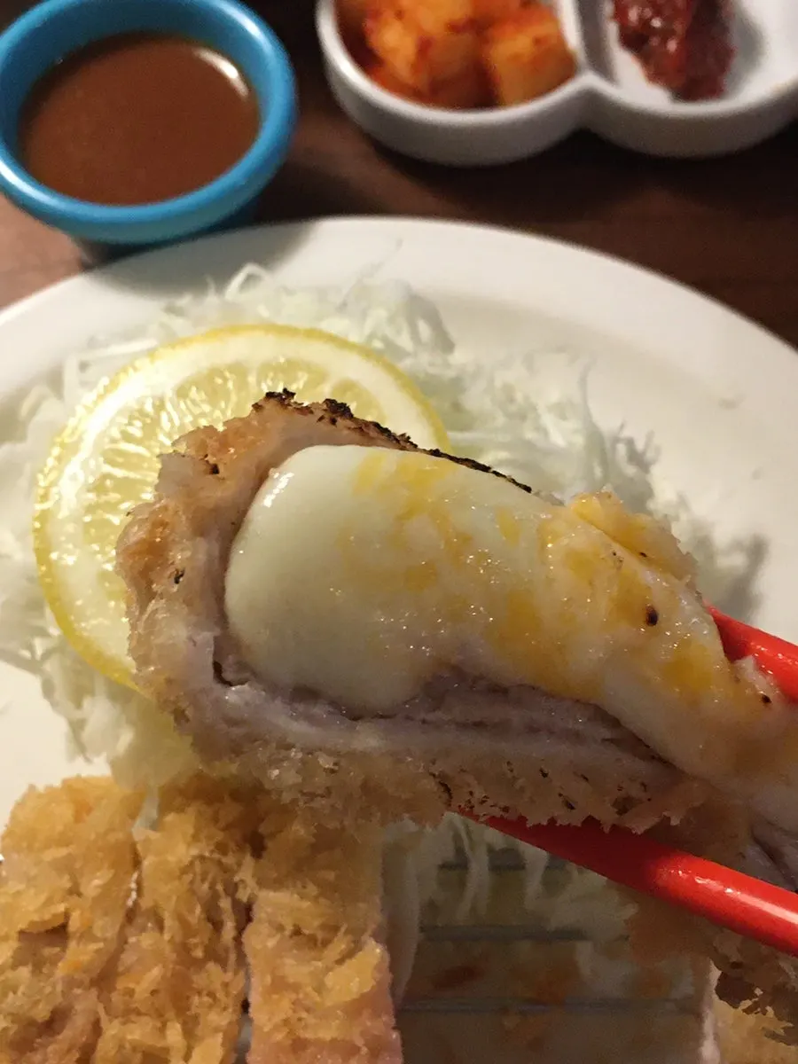 Cheese stretching from the cheese katsu