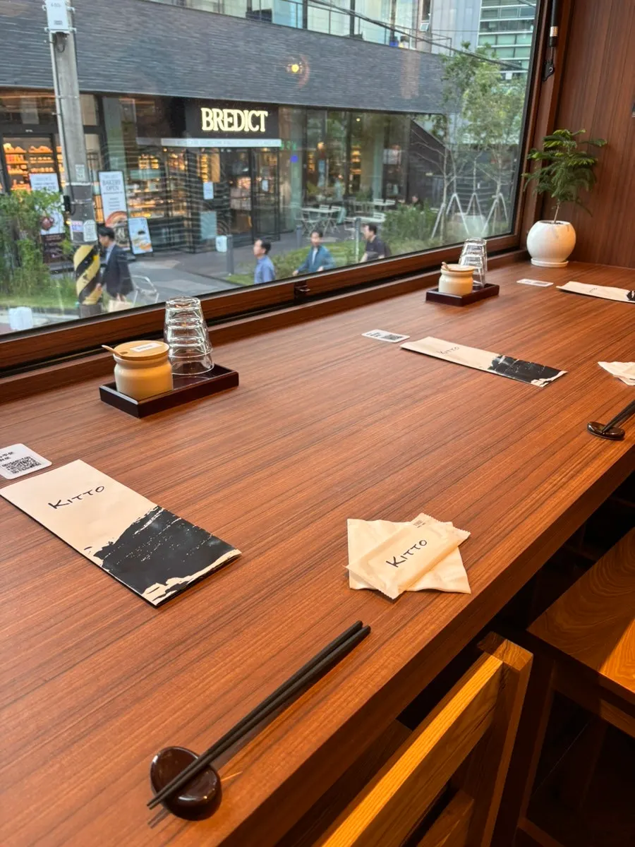 Bar-style window seats along the full-length window