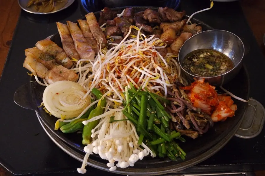 Ogyeopsal, kkodeulsal, and ppyeolsal platter