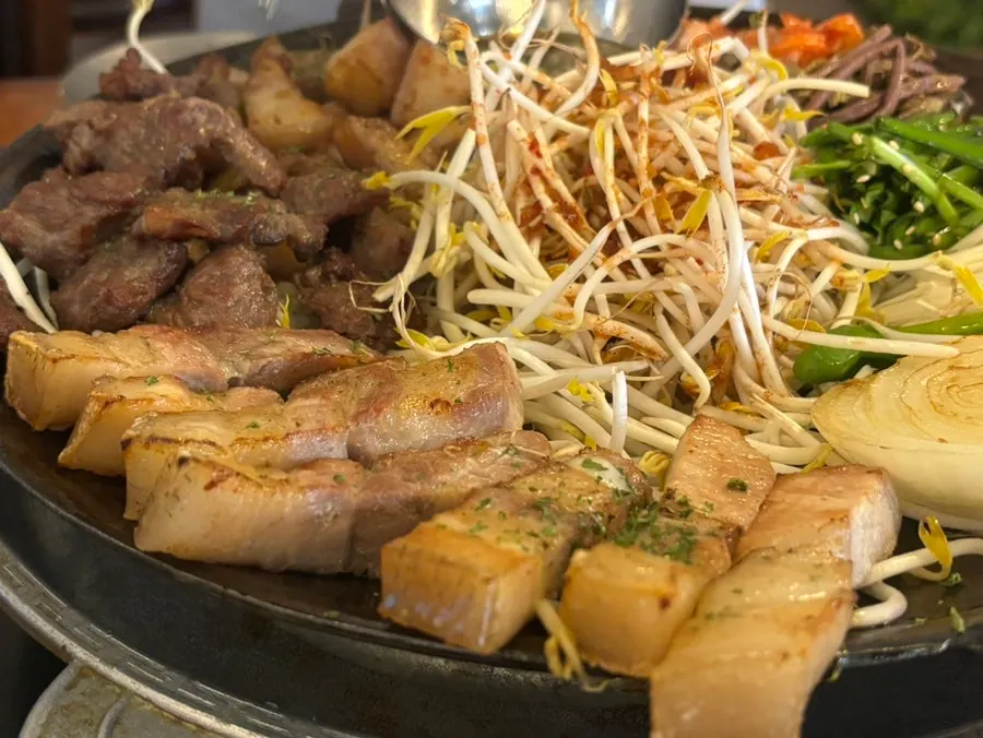Meat served grilled over charcoal