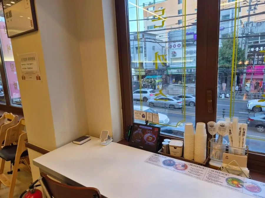 Photos of signature dishes displayed on the wall