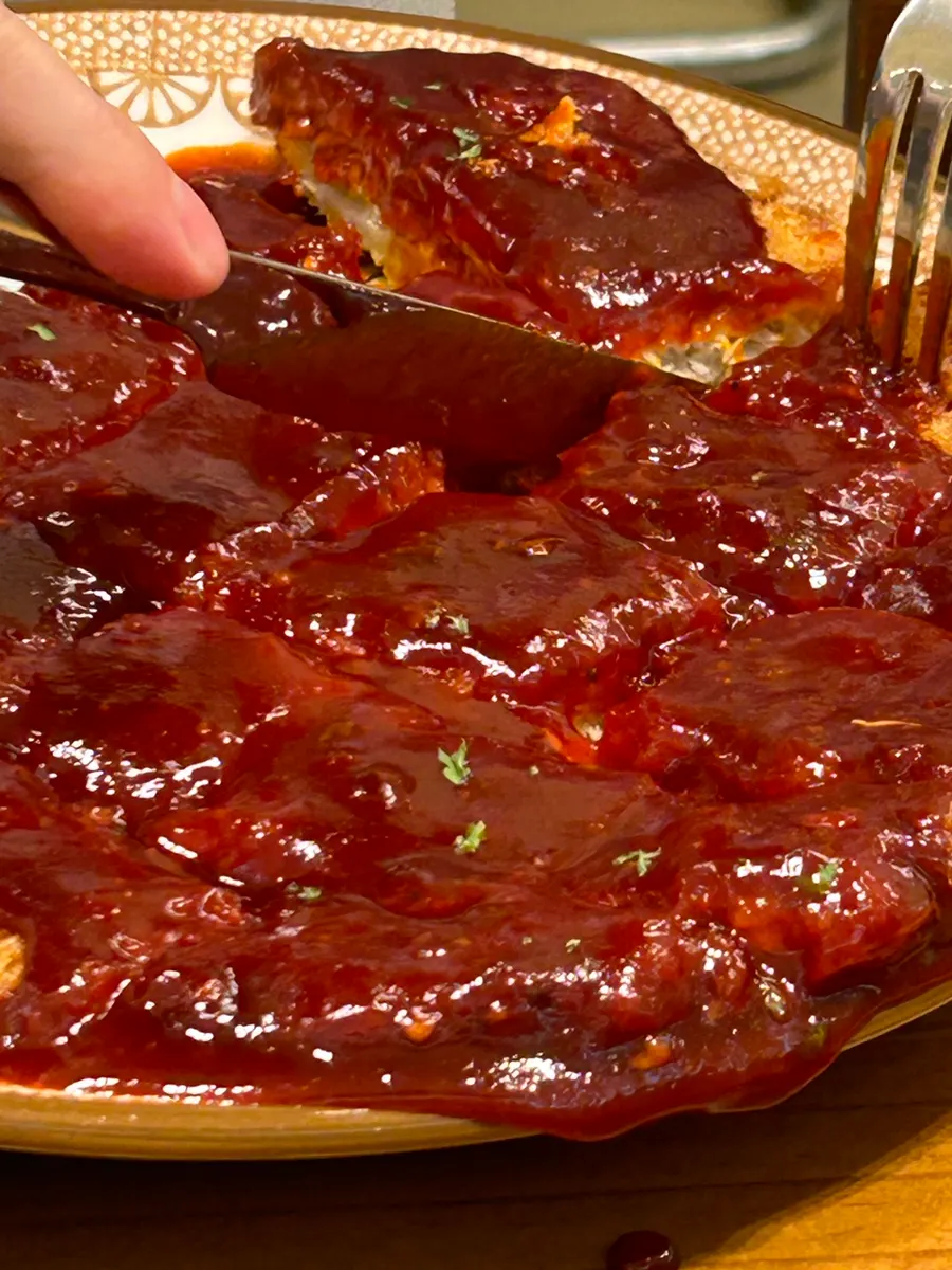 Jumbo pork cutlet drenched in spicy special sauce