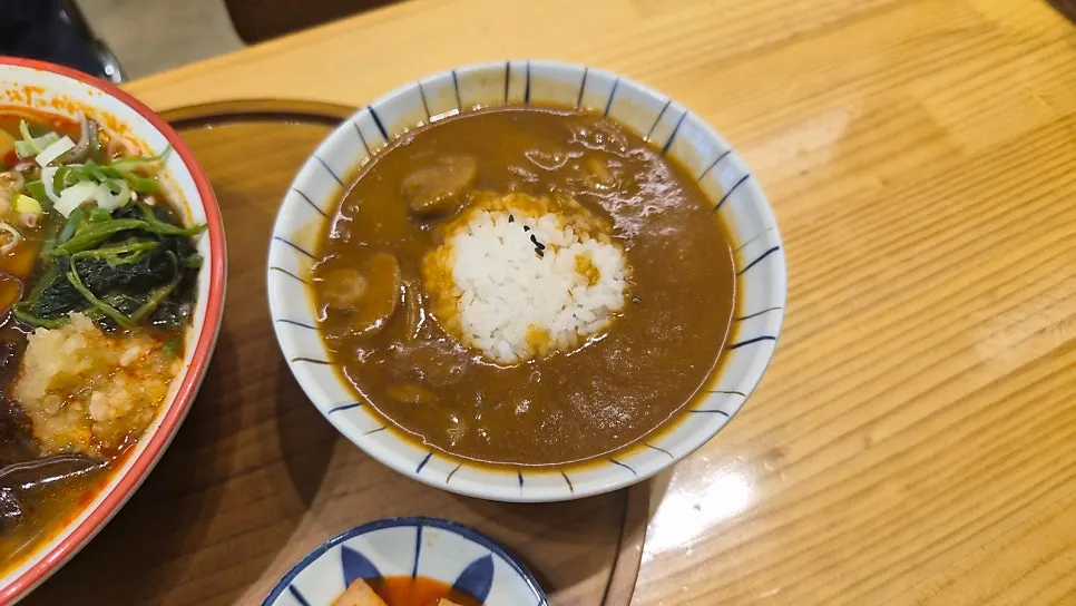 Spicy ramen set served with a pork cutlet side