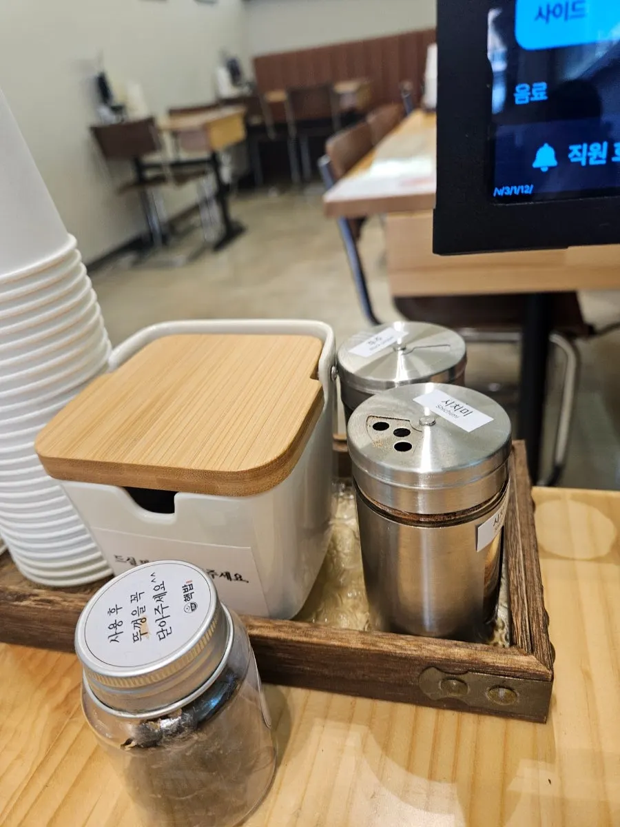 Menu listing rice bowls and ramen at Hekbap Kkachisan Branch
