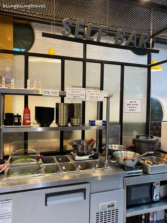 Self-bar where diners can refill their own banchan