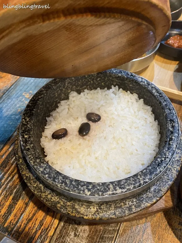 Covered pot rice on the table