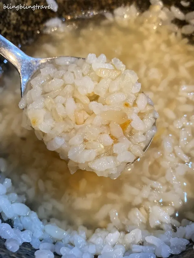 Pot rice with rice scooped out and water added