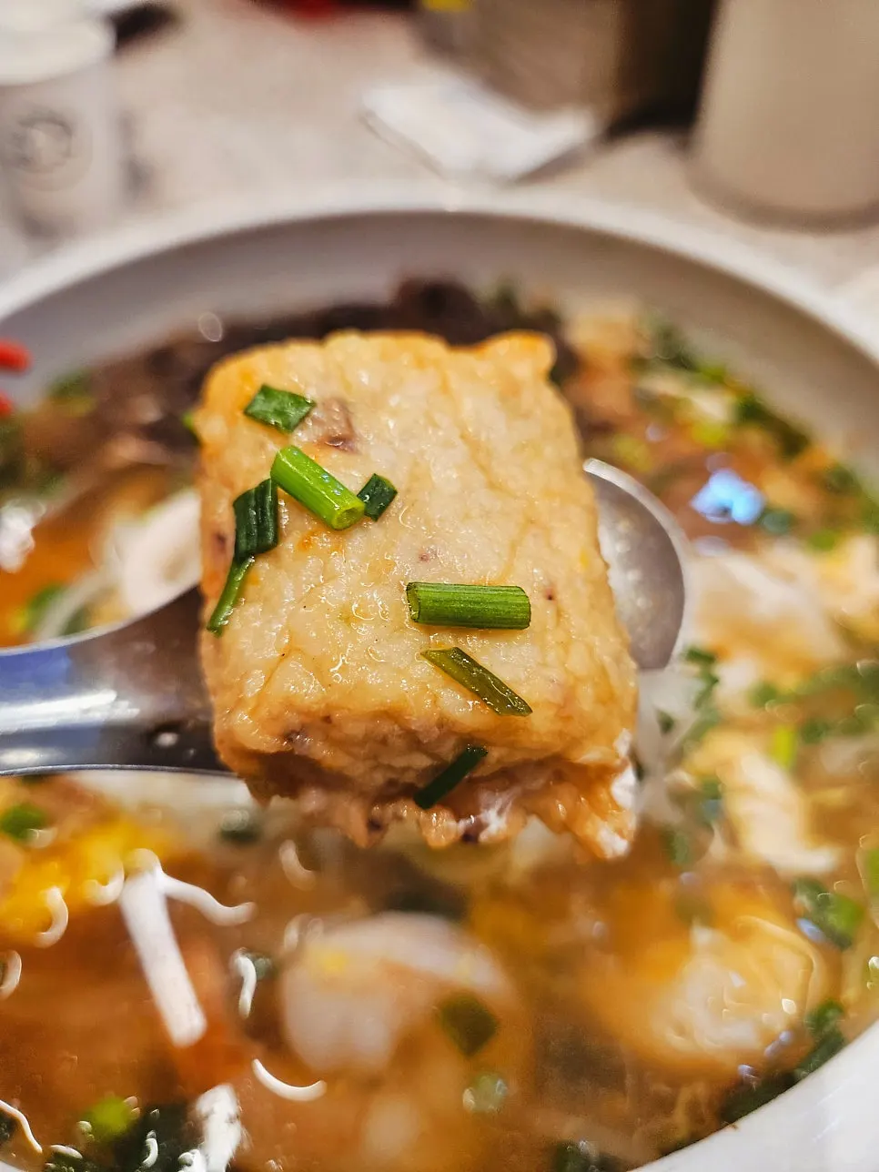 Squid pho with soft-boiled egg and fish cake