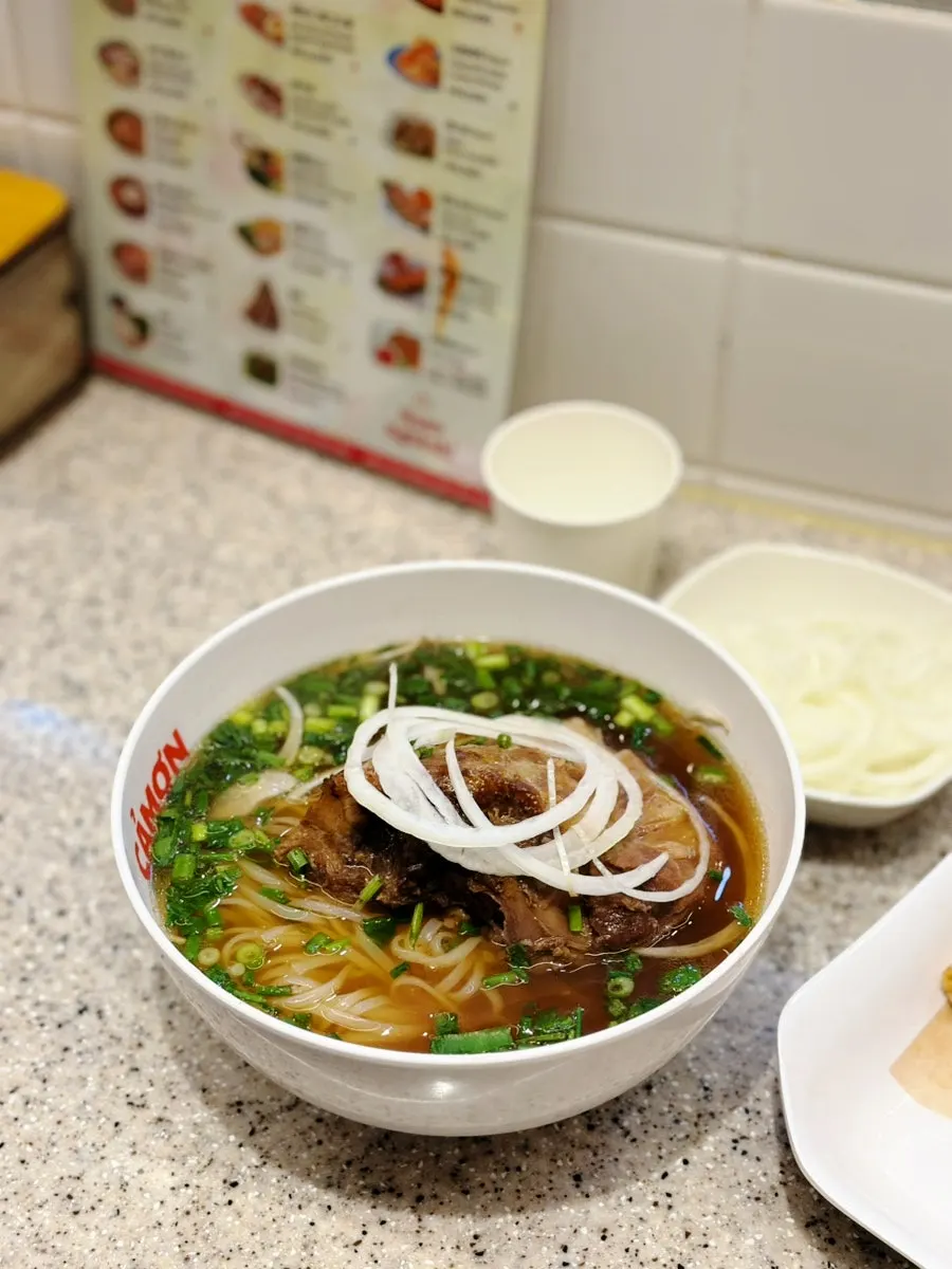 Pork backbone pho with a large backbone on top