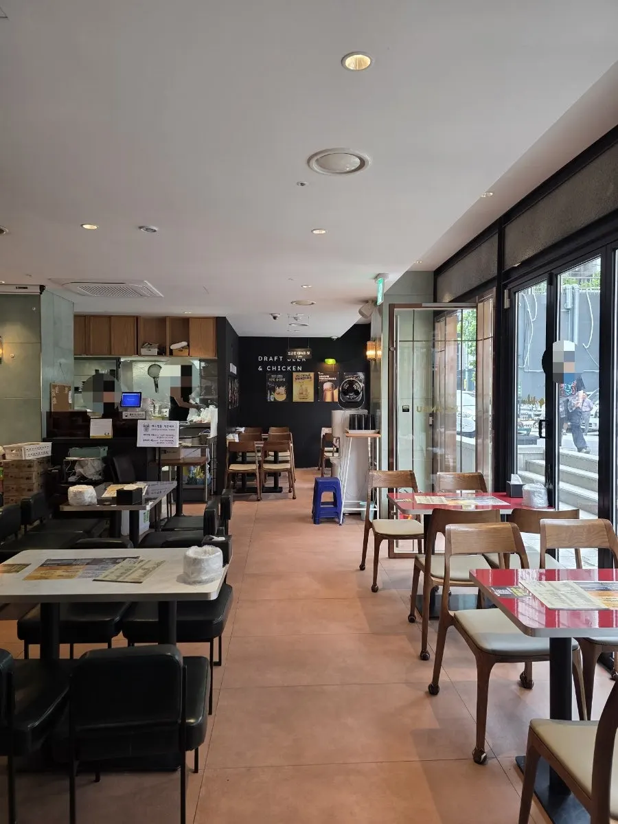 Store entrance with folding doors installed