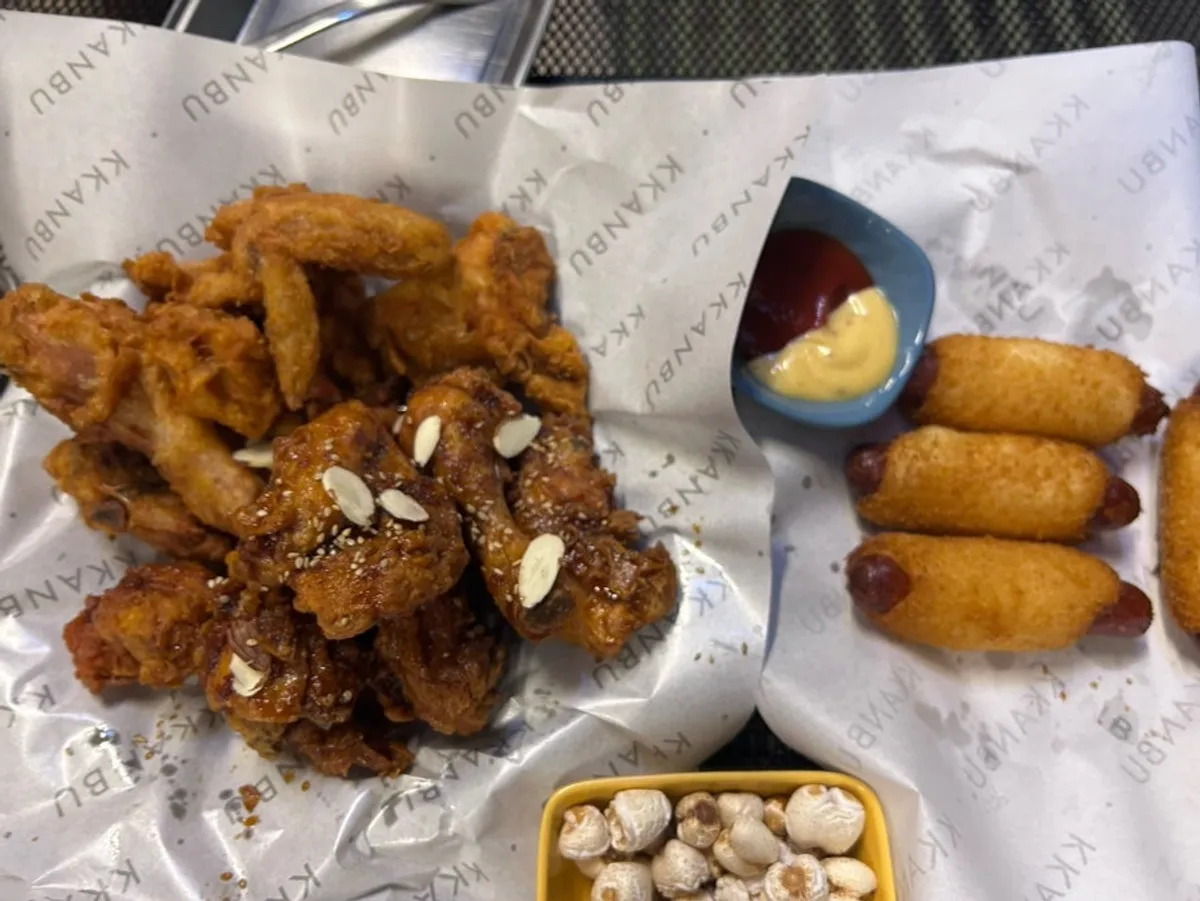 A plate of half fried and half garlic soy chicken