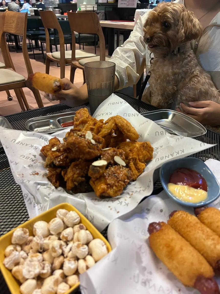 Picking up a piece of chicken