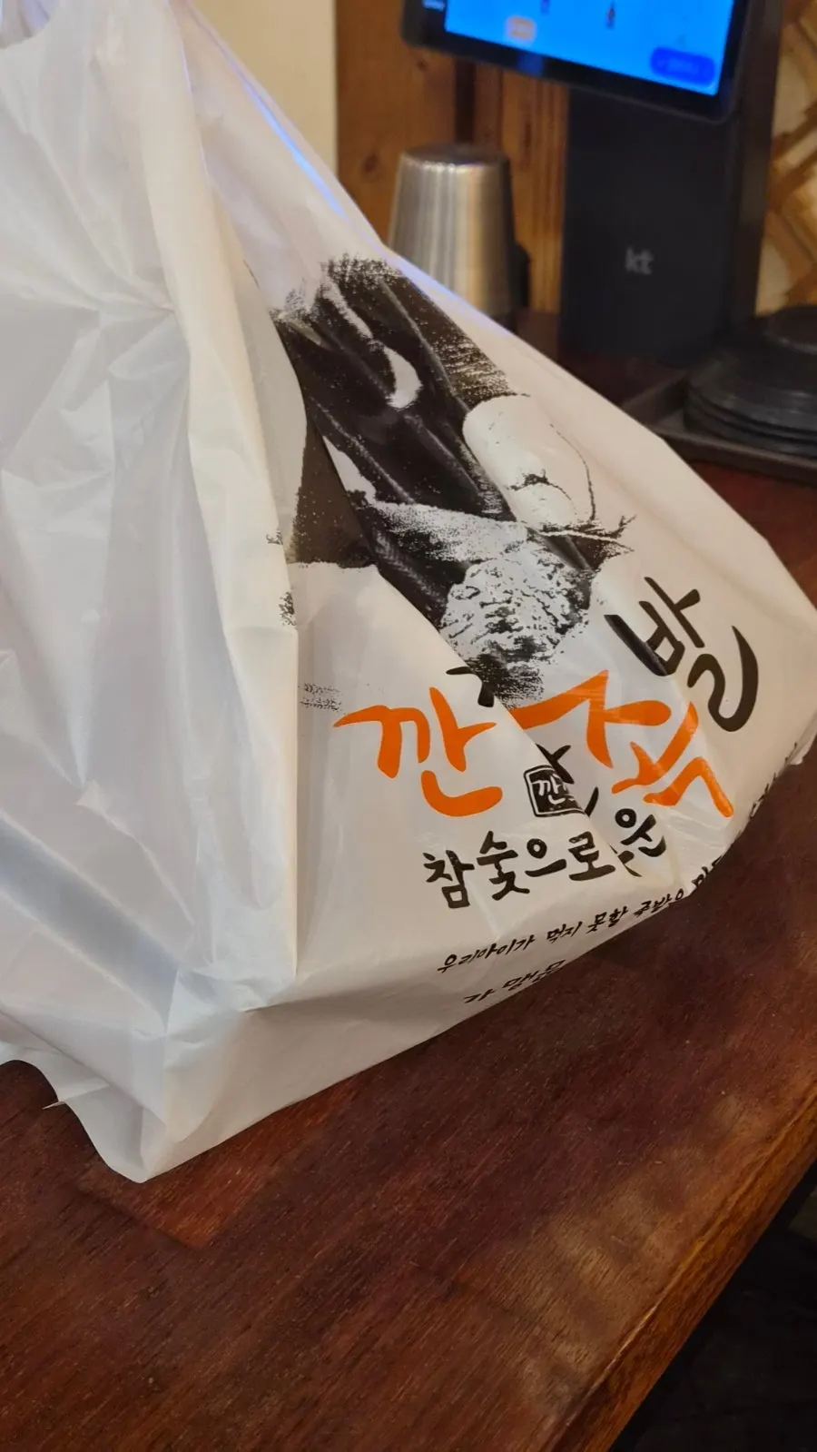 Leftover jjokbal packed in a takeout container