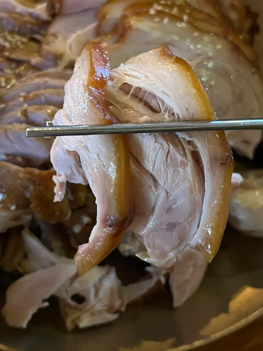 Tender jokbal lifted with chopsticks